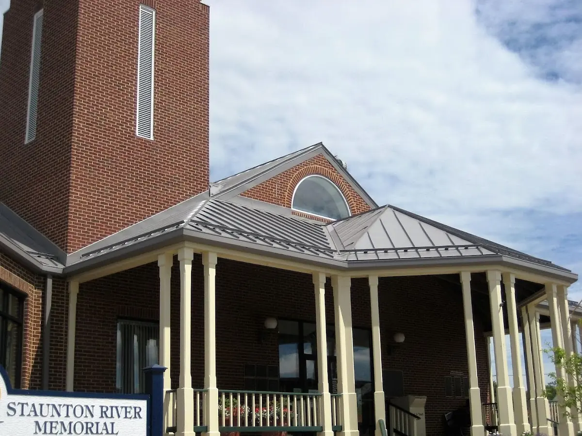 Skilled roofing craftsmen working on a residential roof in Buffalo
